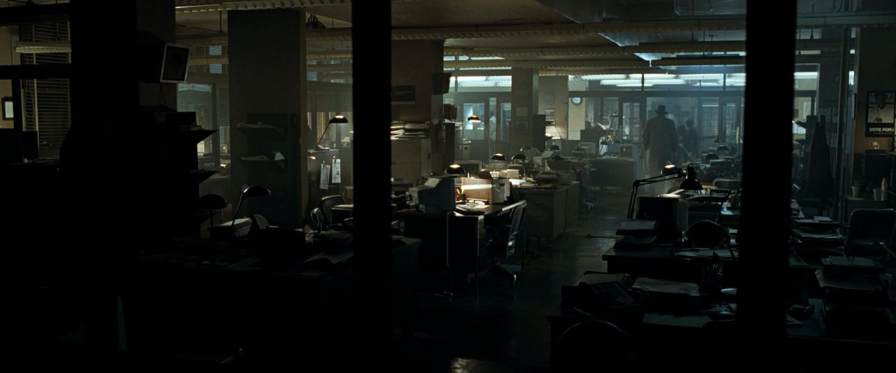 Darkened wide shot of large room